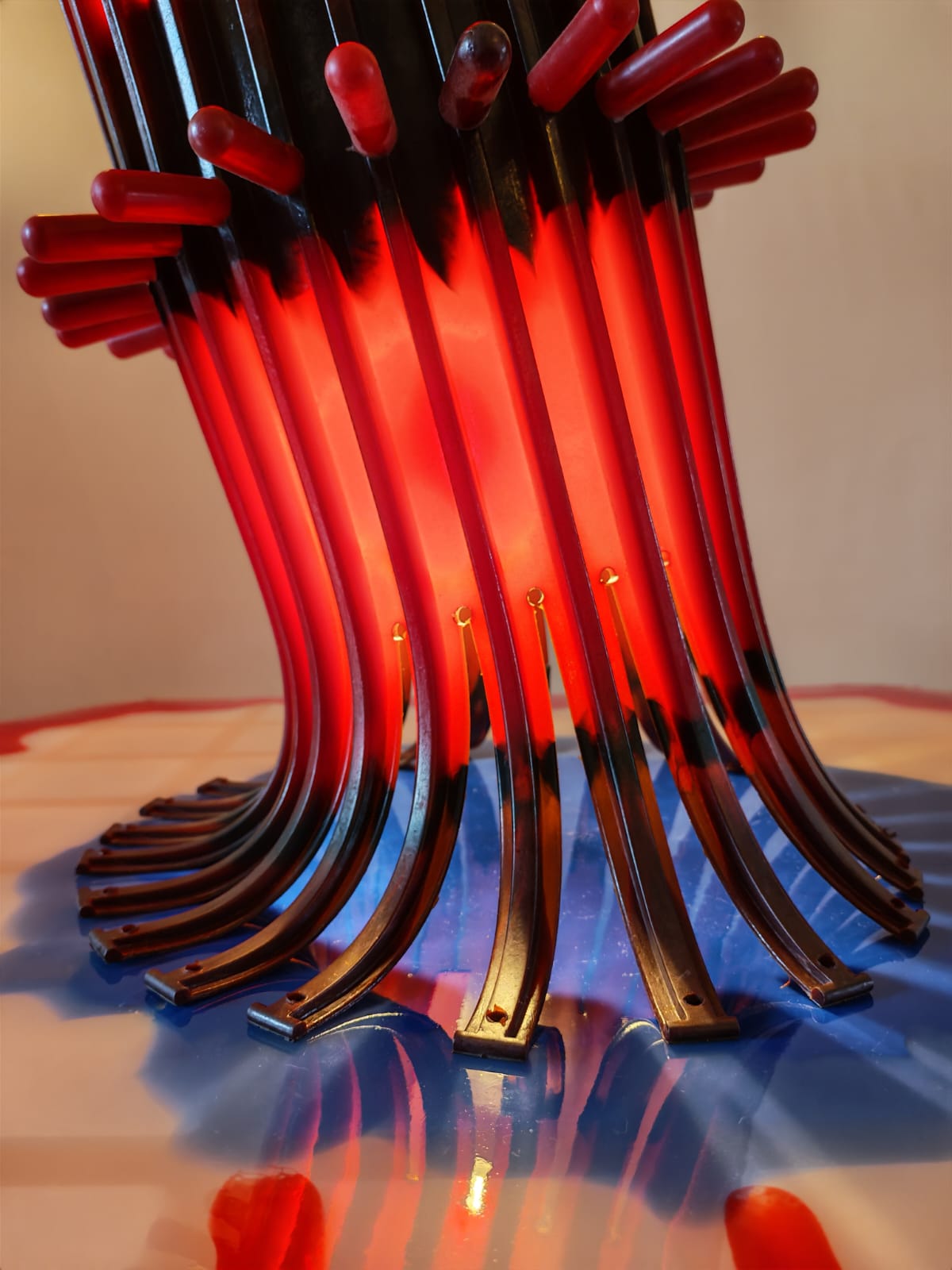 Lamp with red glass fibres on a glass base